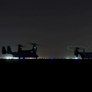 A pair of special forces CV-22 Osprey aircraft preparing for takeoff, Iraq