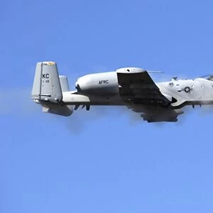A pilot in an A-10 Thunderbolt II fires the planes 30-mm cannon