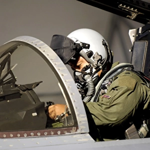 A pilot prepares his F-15A Eagle
