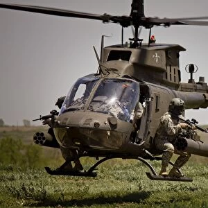 Pilots participate in a military exercise at Fort Riley, Kansas