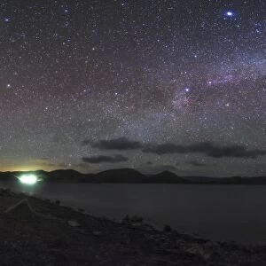 The rising arc of the Milky Way above Yamdrok Lake, Tibet, China