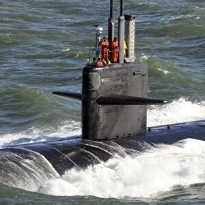 Sailors aboard the attack submarine USS Newport News