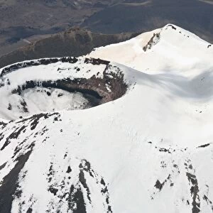 Snow-covered Ngauruhoe cone, Mount Tongariro volcano, New Zealand
