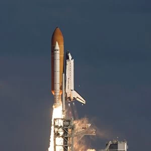 Space Shuttle Atlantis clears the tower at the Kennedy Space Center, Florida