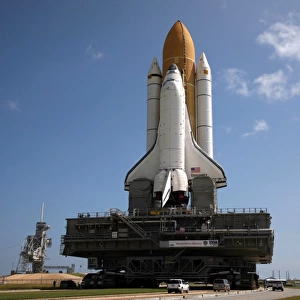 Space Shuttle Discovery makes its way to the launch pad at Kennedy Space Center