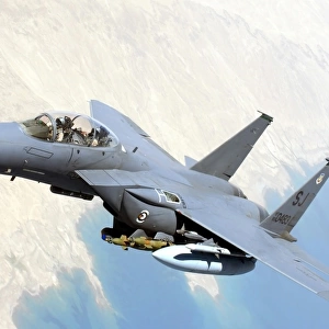 A U. S. Air Force F-15E Strike Eagle aircraft flies over Iraq