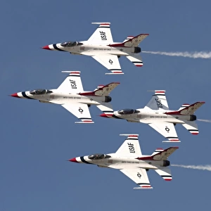 The U. S. Air Force Thunderbirds fly in formation