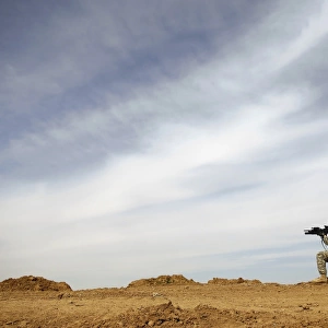 U. S. Army Sergeant provides security during a patrol in Iraq
