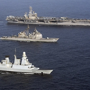 U. S. and French Navy ships transit the Arabian Sea
