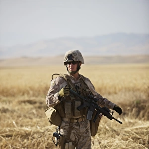 U. S. Marine patrols a wadi near Kunduz, Afghanistan