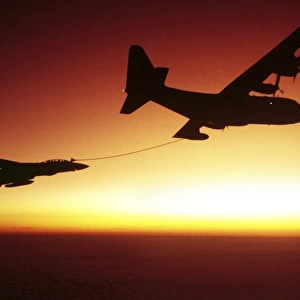 U. S. Navy F-14A Tomcat aerial refueling from a KC-130 Hercules