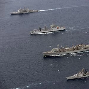 USS Bunker Hill, INS Shakti, USNS Bridge and INS Ranvir transit in formation