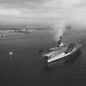USS Constellation leaving New York Harbor for builders trials, 1961