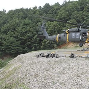 Wolfhounds air assault from a UH-60 Blackhawk helicopter