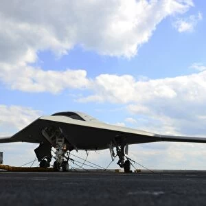 An X-47B Unmanned Combat Air System on the flight deck of USS George H. W. Bush