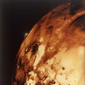 Io, Jupiters moon, from 304, 000 miles. Creator: NASA