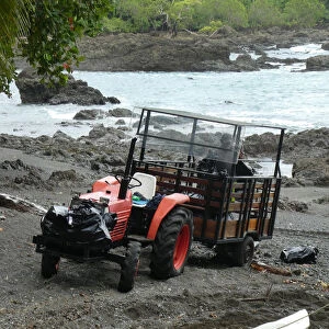 Tractor for transporting tourista and luggage from river arrival at hotel, Costa Rica 2018