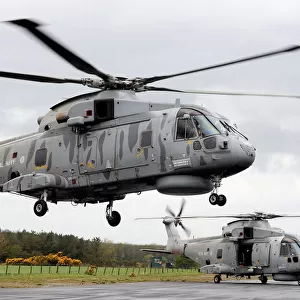 Royal Navy Merlin Helicopter with CHF During Exercise Scottish Lion