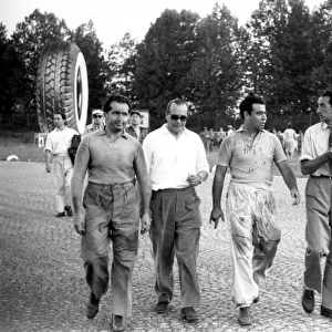 1953 Italian Grand Prix: Alberto Ascari, 3rd position and Onofre Marimon, rerired, walk back to the pits, portrait