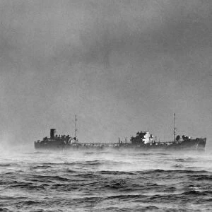 British Royal Navy ships passing through Arctic fog while on convoy duty in the Nothern