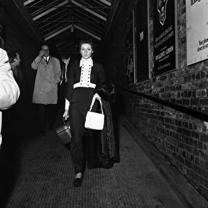 Carolyn Moore walks along the subway at Wilmslow station on her way to meet George Best