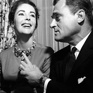 Elizabeth Taylor April 1957 with Husband Mike Todd showing off diamond ring