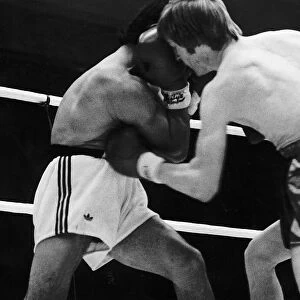 Jim Watt boxer fighting Andre Holyk in ring