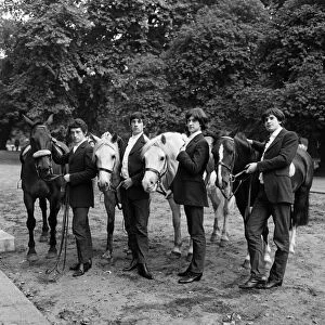 The Kinks take their first riding lesson in Rotten Row, Hyde Park August 1964