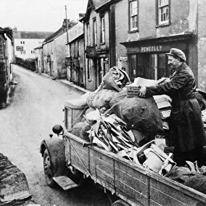 Local resident loads his possessions on to a lorry prior to evacuation