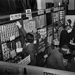 Shoppers at the Grocers Depot Co-Op Stores in Romford. October 1942 P012073