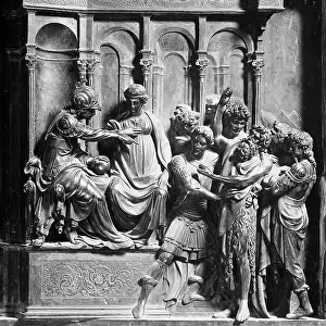Panel portraying St John the Baptist led by Herod. Sculptural work by Lorenzo Ghiberti, part of the Baptismal Font from Siena Baptistry