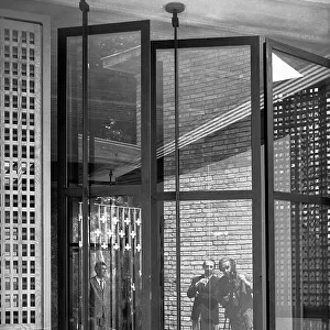 Pavilion of Venezuela designed by Carlo Scarpa at the Venice Biennale; reflections in the glass you see the photographer Ferruccio Leiss and the architect Carlo Scarpa