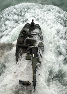An amphibious assault vehicle leaves the well deck of USS Iwo Jima An amphibious assault vehicle leaves the well deck of USS Iwo Jima