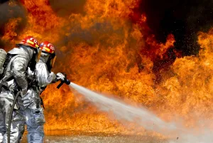Firefighters combat a JP-8 jet fuel fire Firefighters combat a JP-8 jet fuel fire