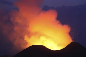 Lava in crater glowing during blue hour on Nyamuragira Volcano Lava in crater glowing during blue hour on Nyamuragira Volcano