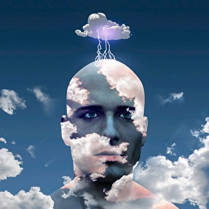 Mans head in clouds