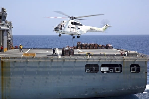 An SA-330J Puma helicopter delivers supplies to USS Kearsarge An SA-330J Puma helicopter delivers supplies to USS Kearsarge